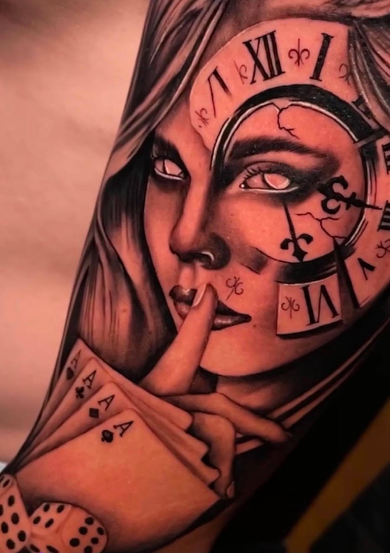 Chicano-style realism tattoo of a hooded woman with a clock face and playing cards by Love and Chaos Tattoo Gallery, Mudgee NSW