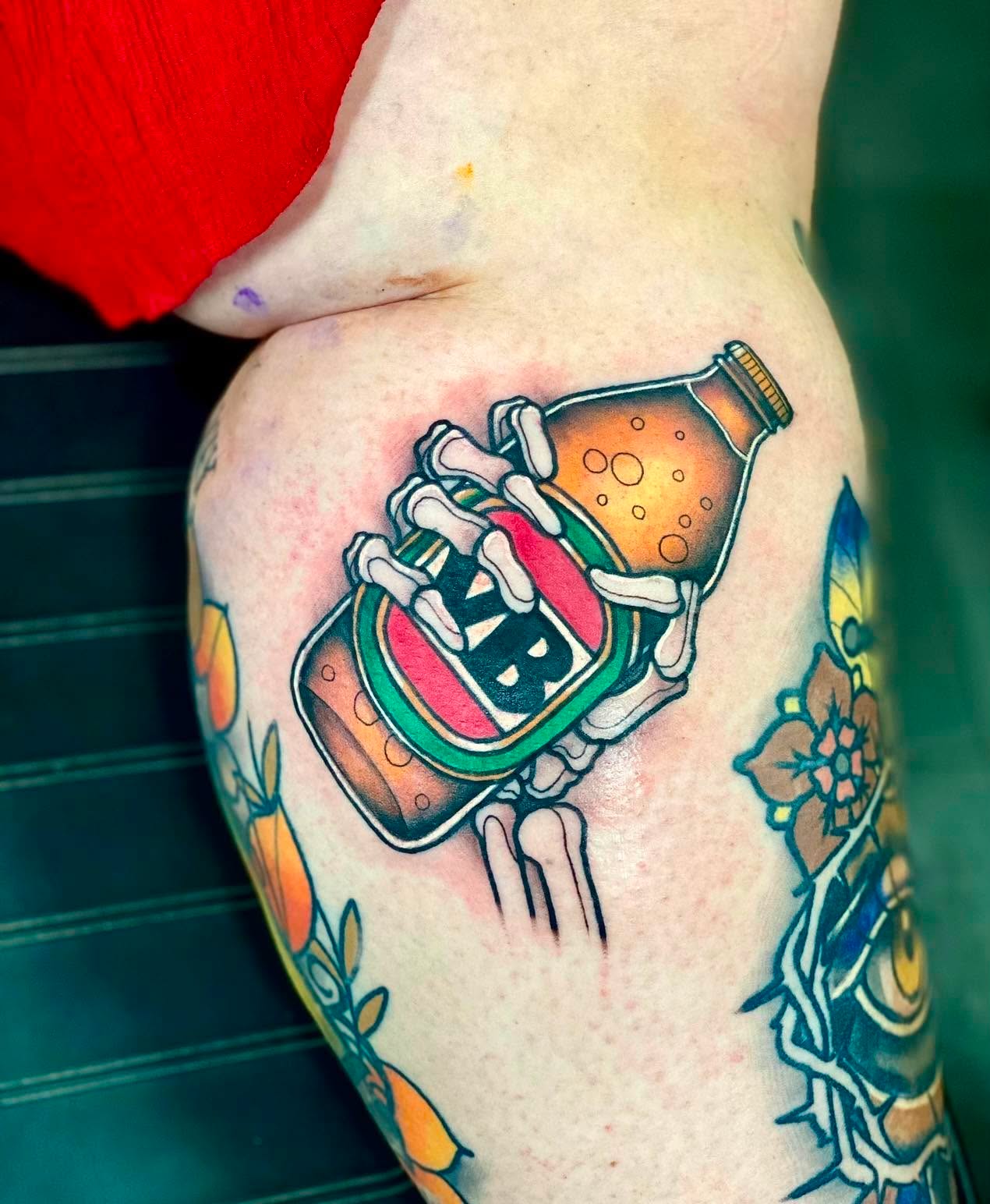 Neo-traditional colour skeleton hand and beer bottle tattoo by Love and Chaos Tattoo Gallery, Mudgee NSW